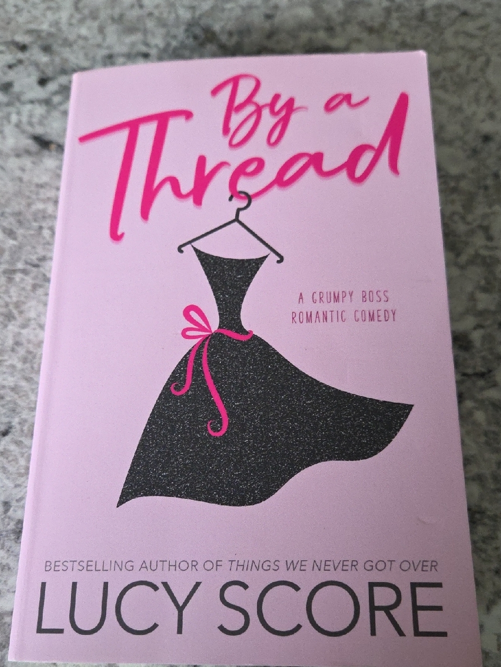 By a Thread by Lucy Score - Pink Cover Romance Novel